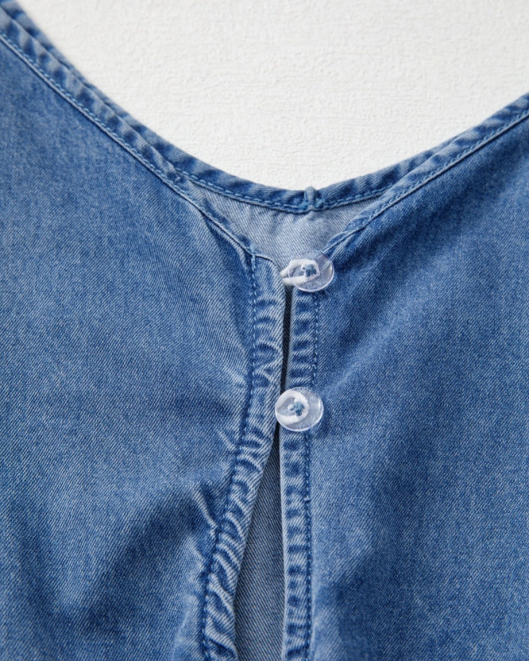 Chambray Spaghetti Strap Romper with Ruffle Hem and Belted Waist